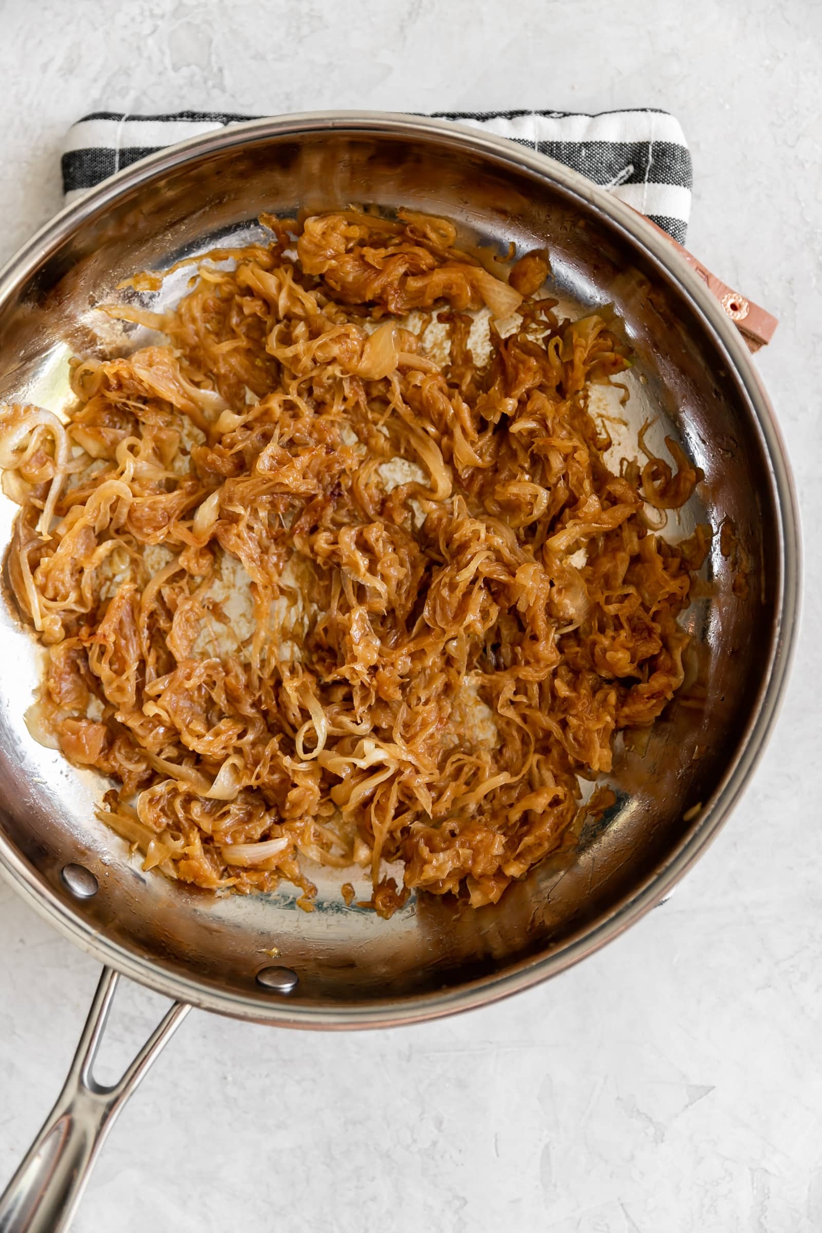 Caramelized Onion Pear & Walnut Stuffing. A flavorful and easy-to-make Thanksgiving stuffing made with caramelized onions, pears, celery, walnuts, and dried cranberries.