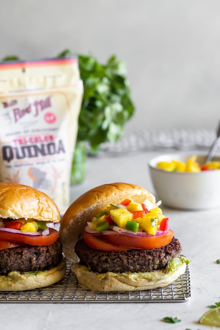 easy black bean burger recipe on a wire rack with mango salsa