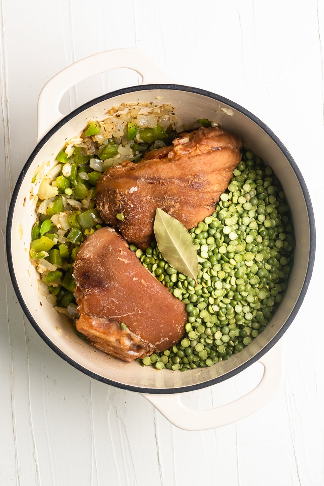 ham hocks, dried green split peas, cuban sofrito in a dutch oven