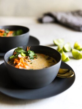 Vegetarian Thai coconut soup with lime slices